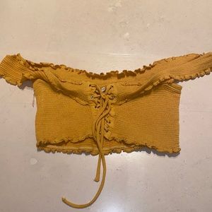 Yellow cropped shirt